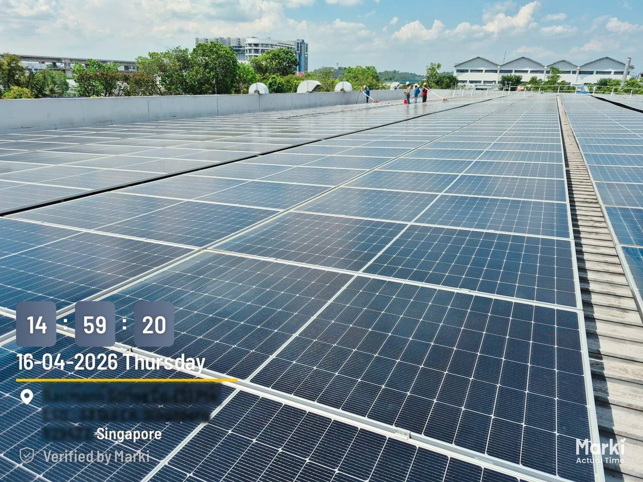 Rooftop modules after cleaning, clear surface reflecting the sky
